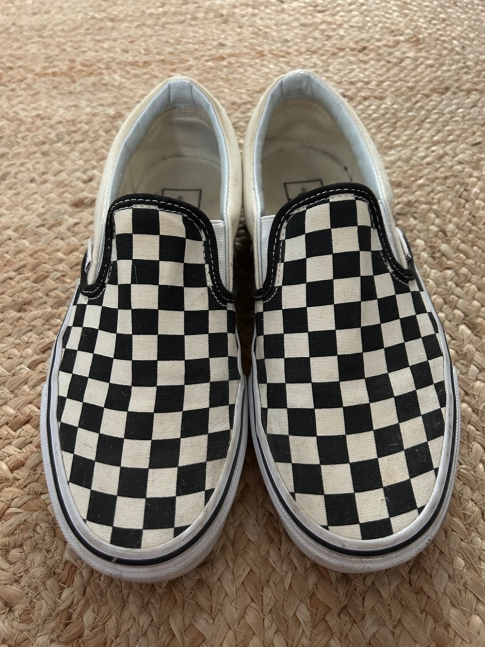 Vans Black and White Checker Slip-On Sneakers